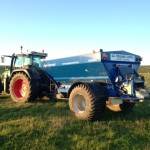 tractor and agricultural lime spreader